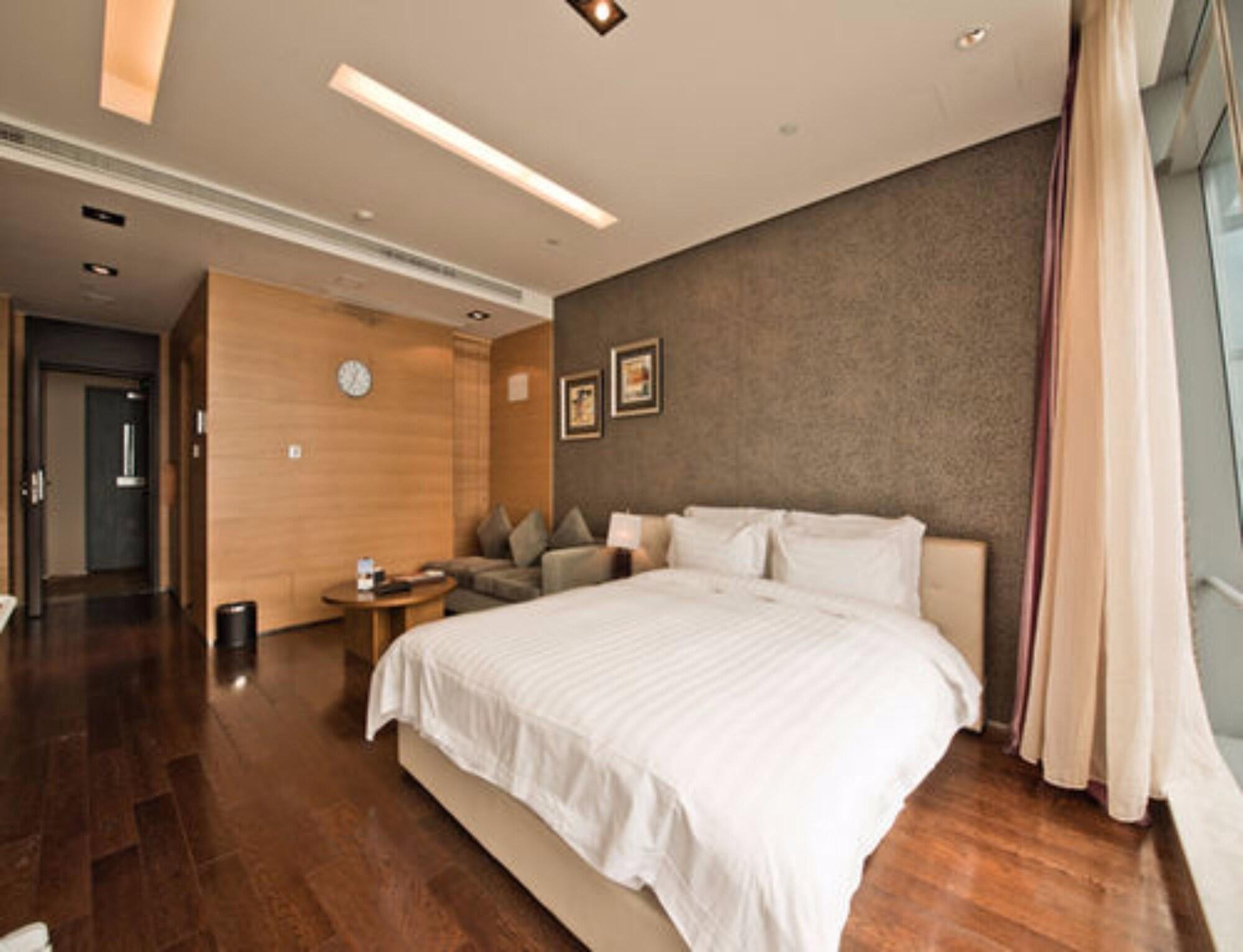 Grand Madison Qingdao Harbour-View Central（Former Qingdao Farglory Hotel） Esterno foto