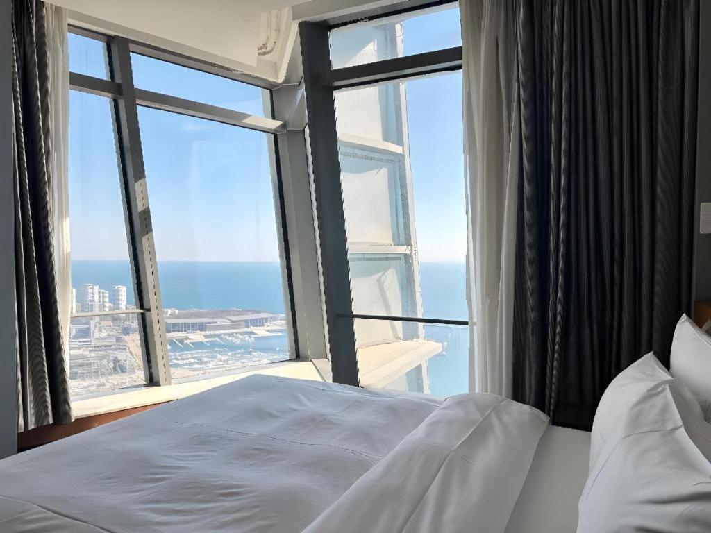 Grand Madison Qingdao Harbour-View Central（Former Qingdao Farglory Hotel） Esterno foto