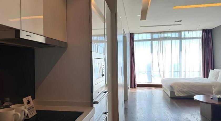 Grand Madison Qingdao Harbour-View Central（Former Qingdao Farglory Hotel） Esterno foto